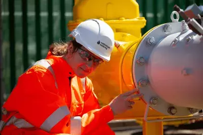 Female National Gas Metering Employee 